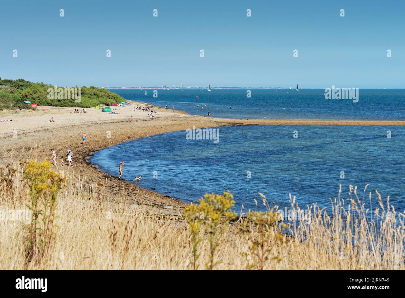Crowds On The Beach At Lepe Country Park On A Hot And Sunny Summers Day Crowds On The Beach At Lepe Country Park On A Hot And Sunny Summers Day