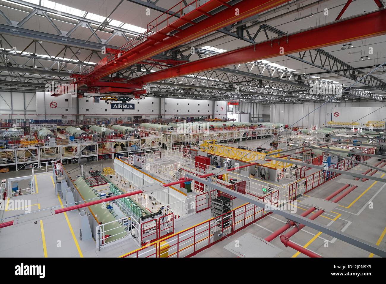 24 August 2022, Hamburg: Airbus employees work on the A320 fuselages in ...