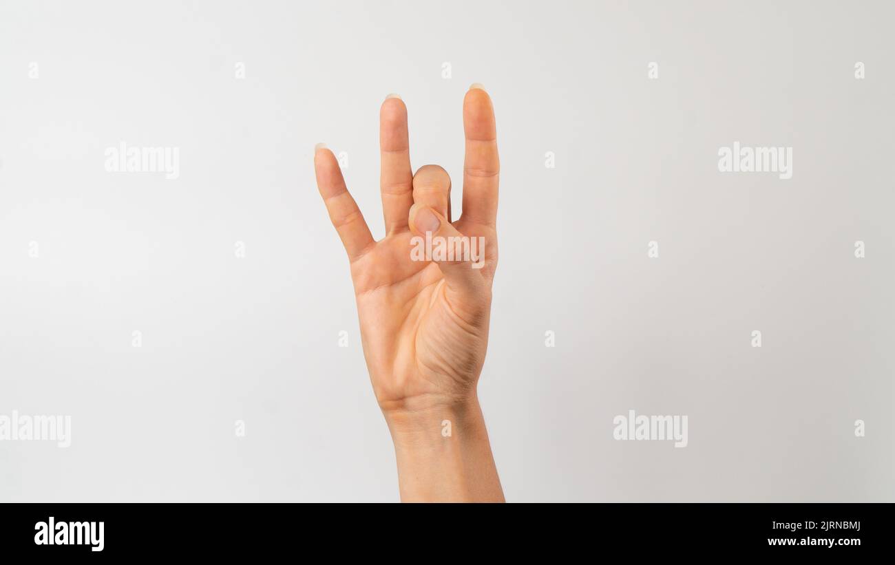 Sign language of the deaf and dumb people, number, digit 8 Stock Photo