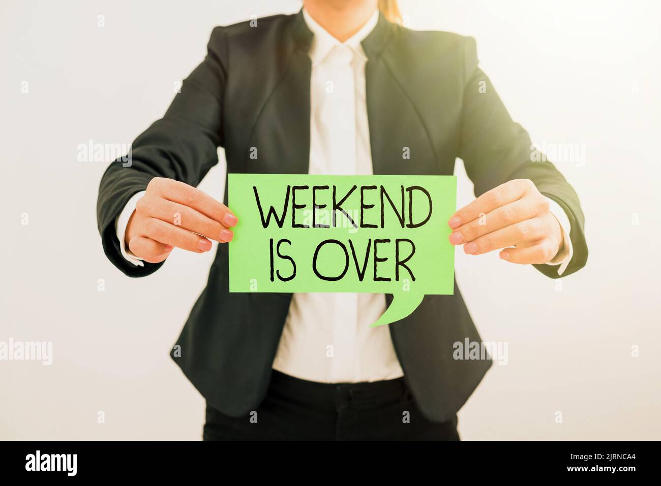 Inspiration showing sign Weekend Is Over. Internet Concept Time for relax has ended back to routine everyday activities Businessman in suit holding Stock Photo