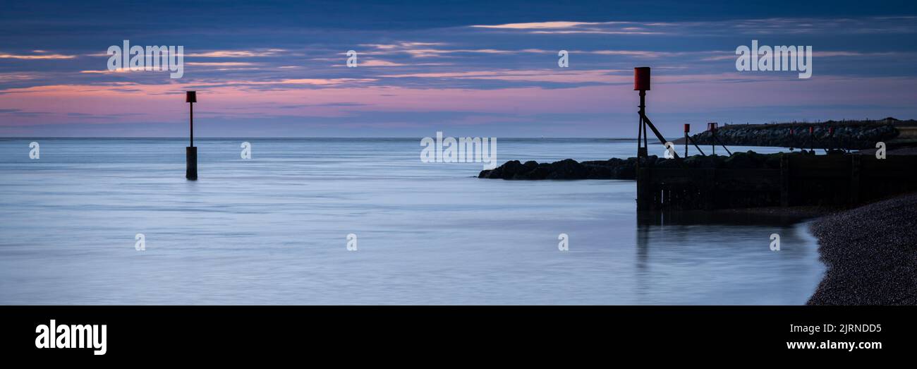 A silhouette of the shore on the sunset Stock Photo - Alamy