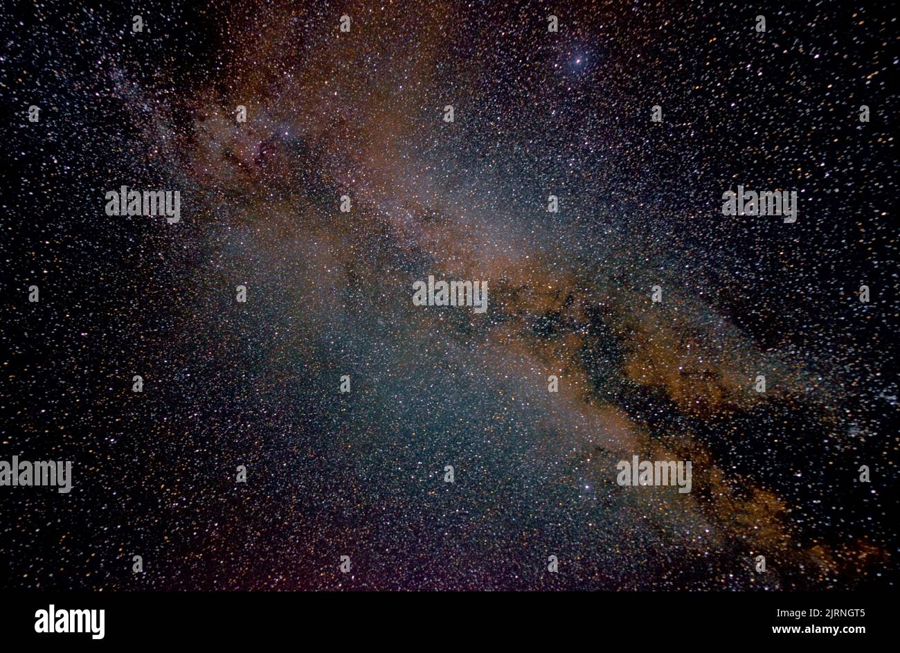 deep space with colourful milky way as the background in late summer near Fulda and Frankfurt, Hesse Germany. Late August starry night sky. Stock Photo