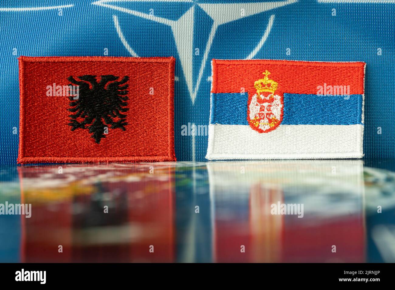 Conflict of Albanians and Serbs in Kosovo, Concept of the Serbian and Albania flag, Problems of the Serb minority in Albania and the border conflict Stock Photo