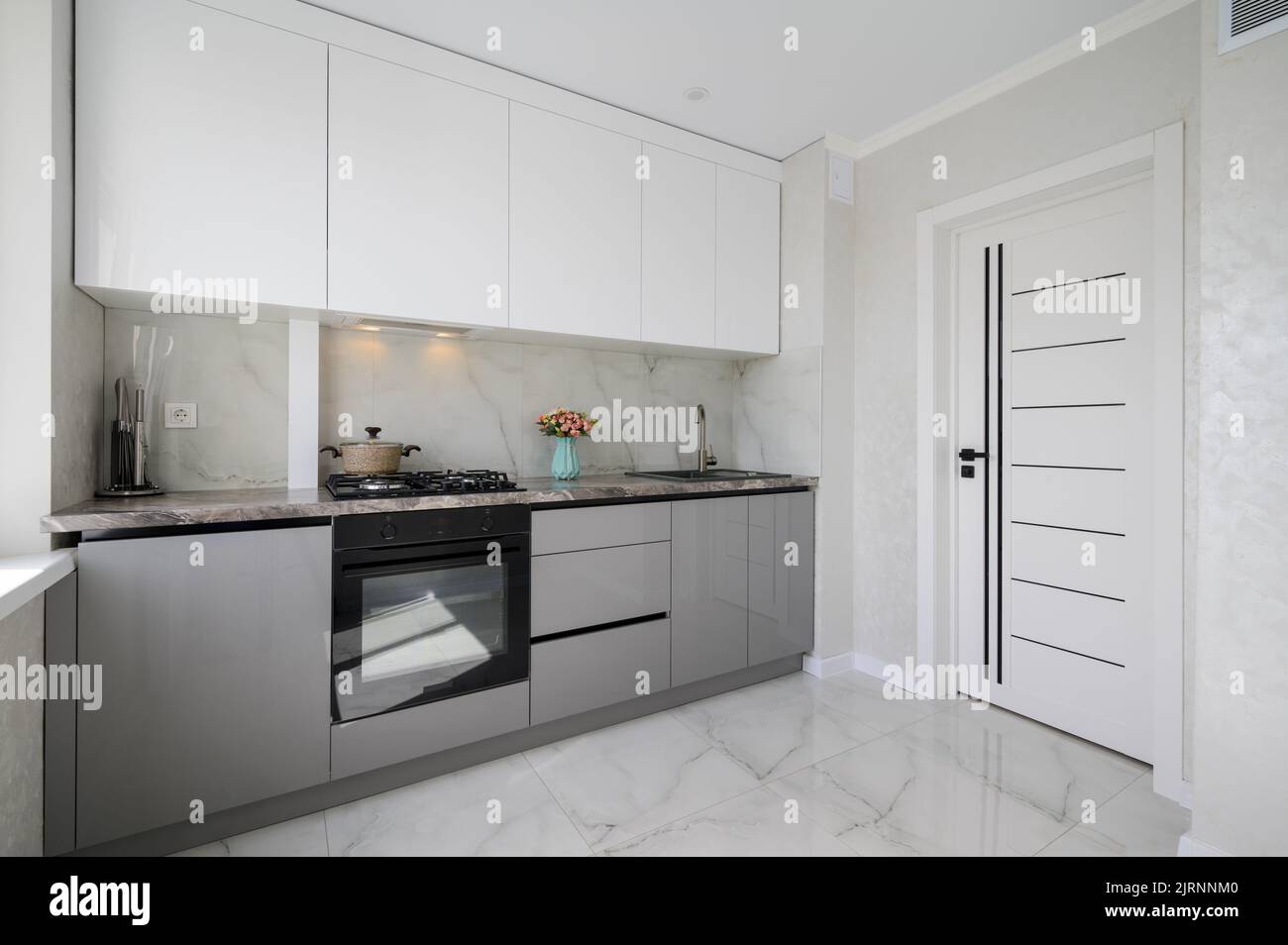 White modern domestic kitchen furniture and interior Stock Photo