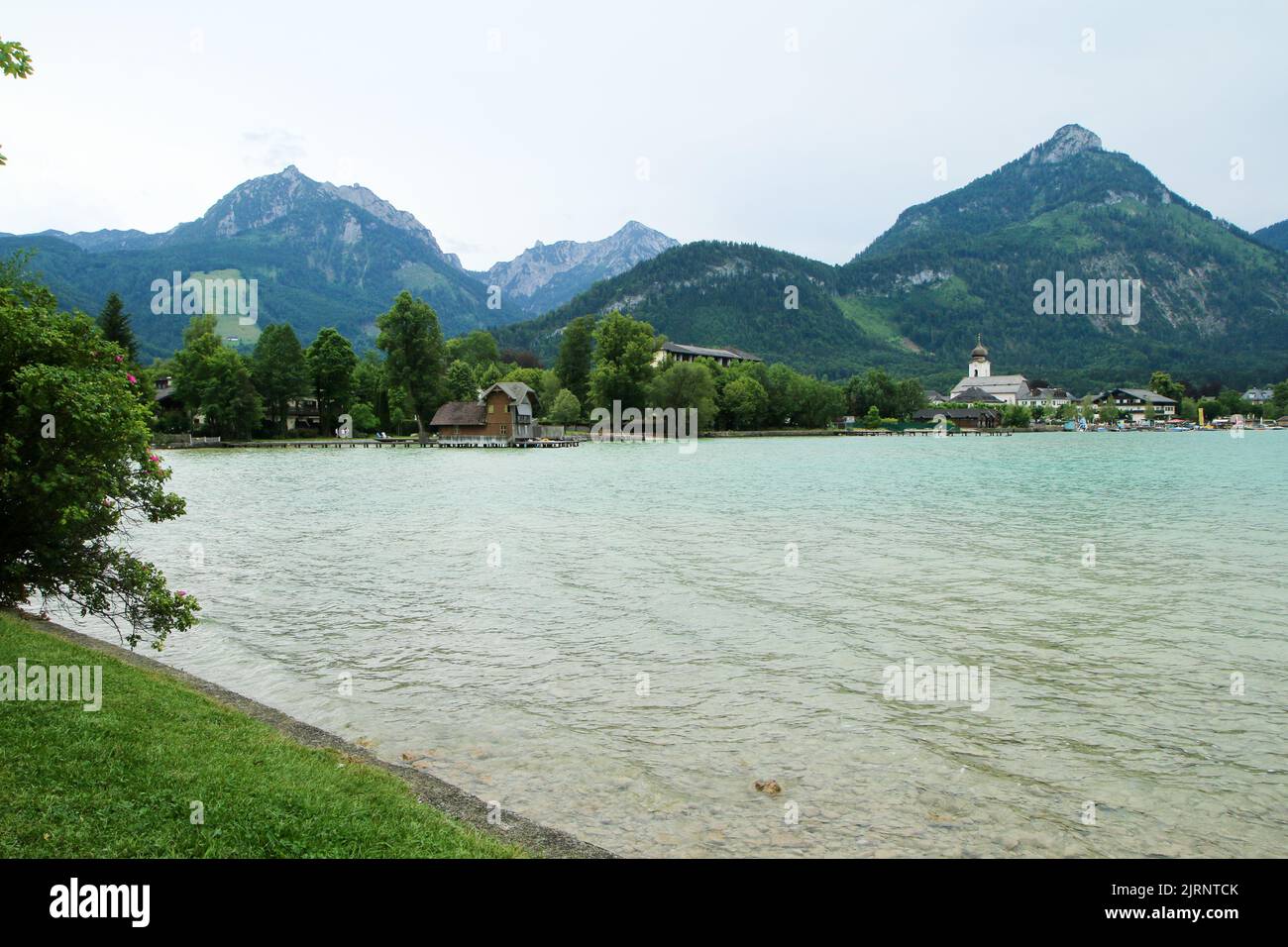 The glacier lake in Austria in the Alps during the rainy and cloudy day. Travel destination for the tourists. Stock Photo
