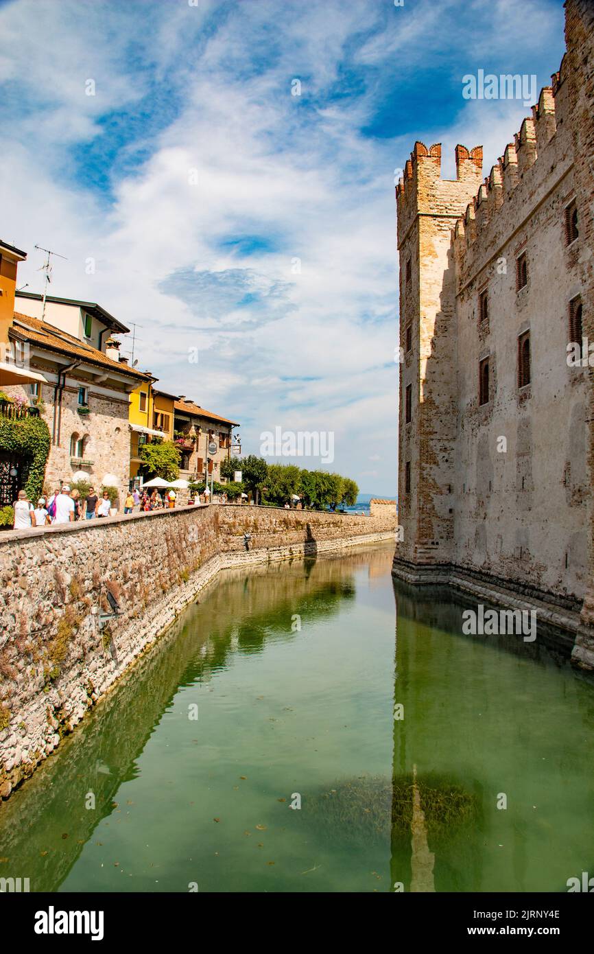 Stunning and imposing Castello Scaligero on Lake Garda, Sirmione, Brescia, Italy Stock Photo