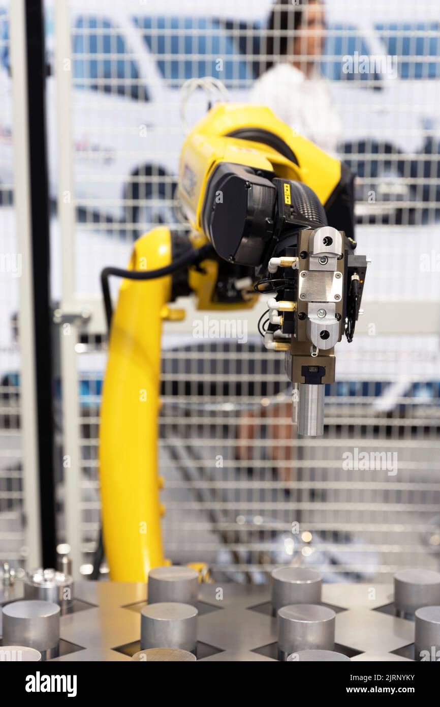 Industrial pick and place, insertion, quality testing or machine tending robot arm Stock Photo