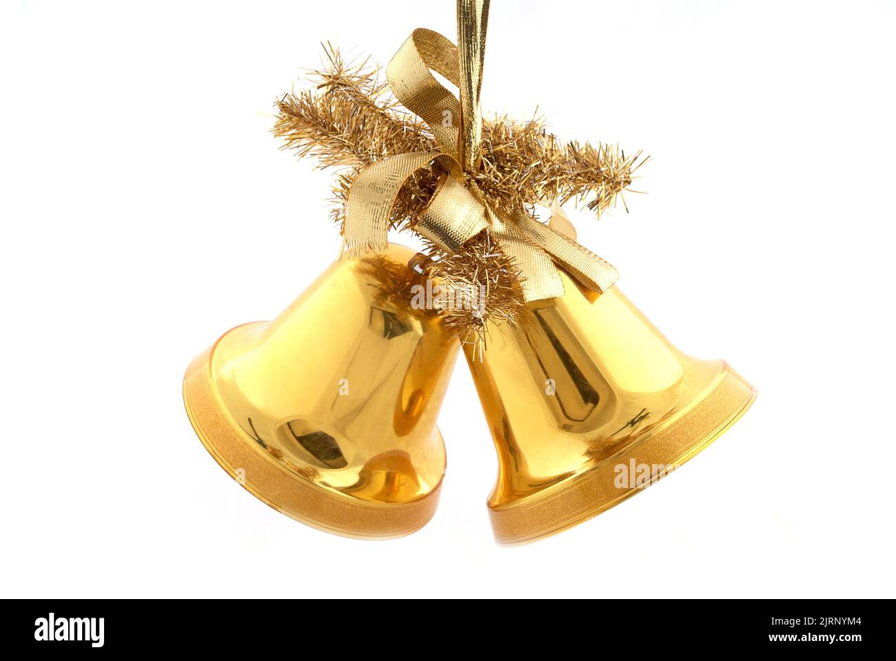 A pair of christmas decorations. Gold bells with ribbon Stock Photo