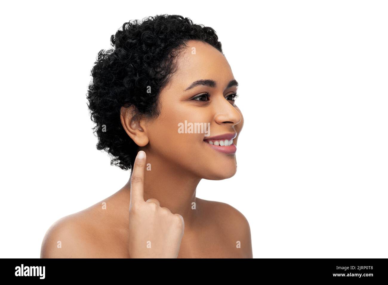smiling african american woman showing her ear Stock Photo