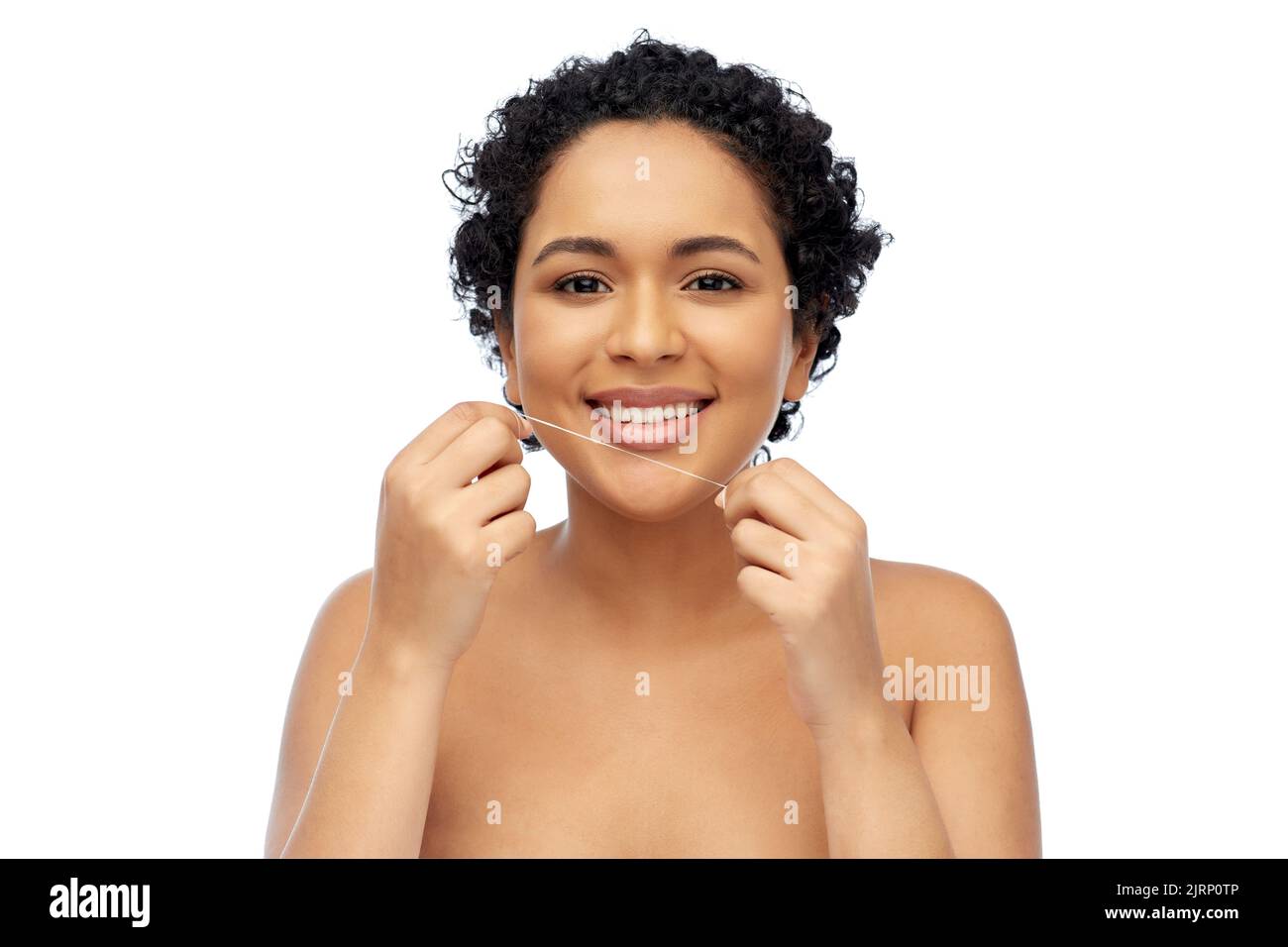 african woman cleaning teeth with dental floss Stock Photo Alamy