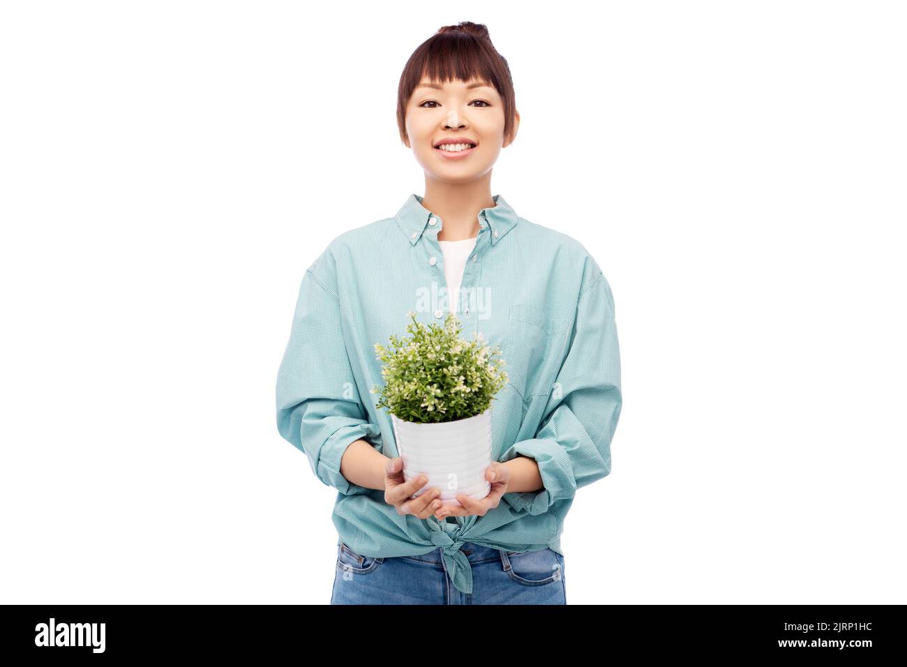 happy smiling asian woman holding flower in pot Stock Photo - Alamy