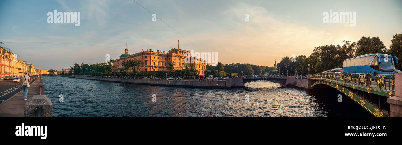 Panorama of Mikhailovsky Castle in St. Petersburg and Fontanka in summer evening at sunset. Stock Photo