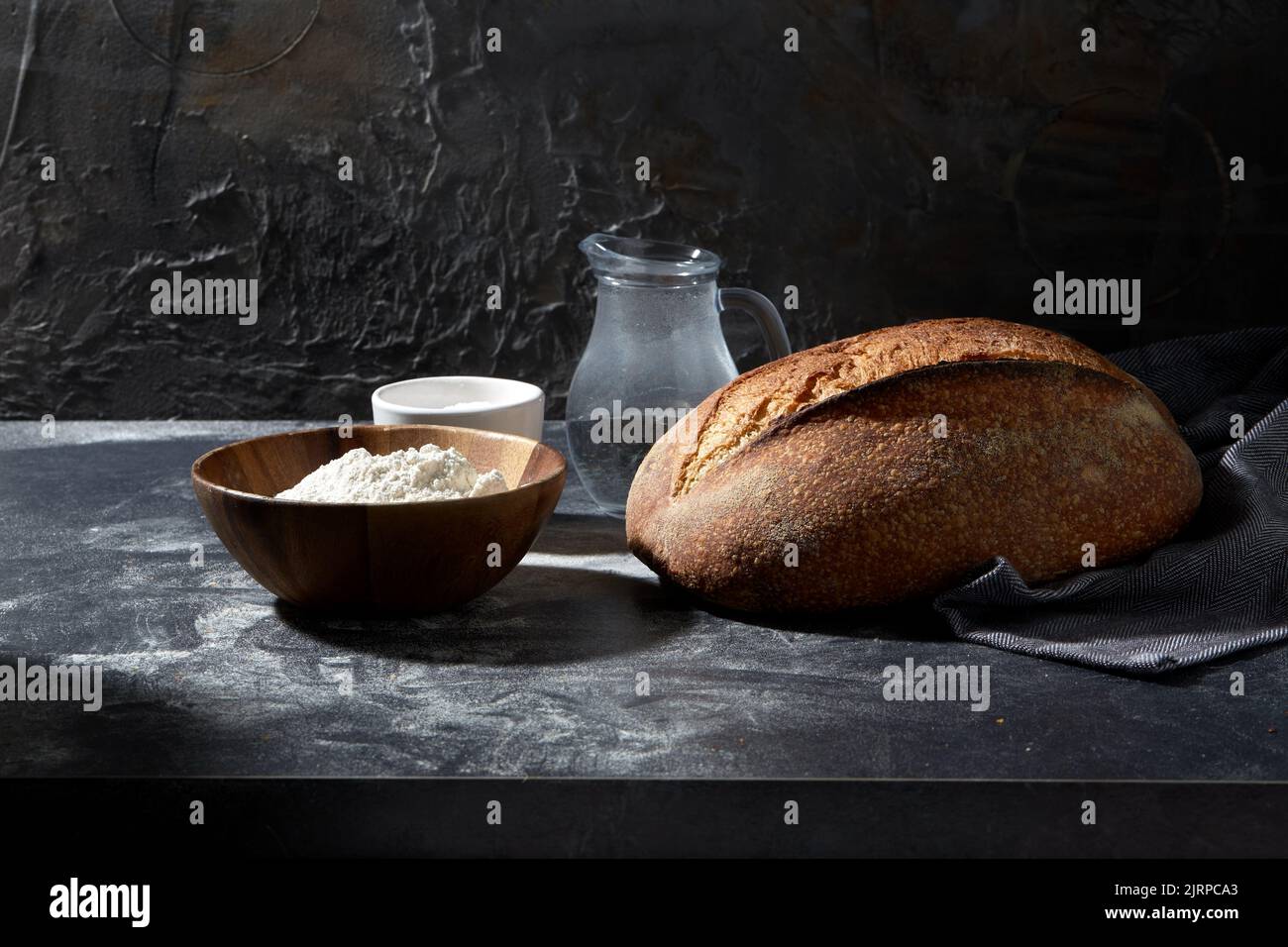 bread, wheat flour, salt and water in glass jug Stock Photo Alamy