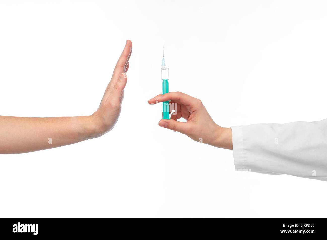 hand with syringe and showing stop gesture Stock Photo Alamy