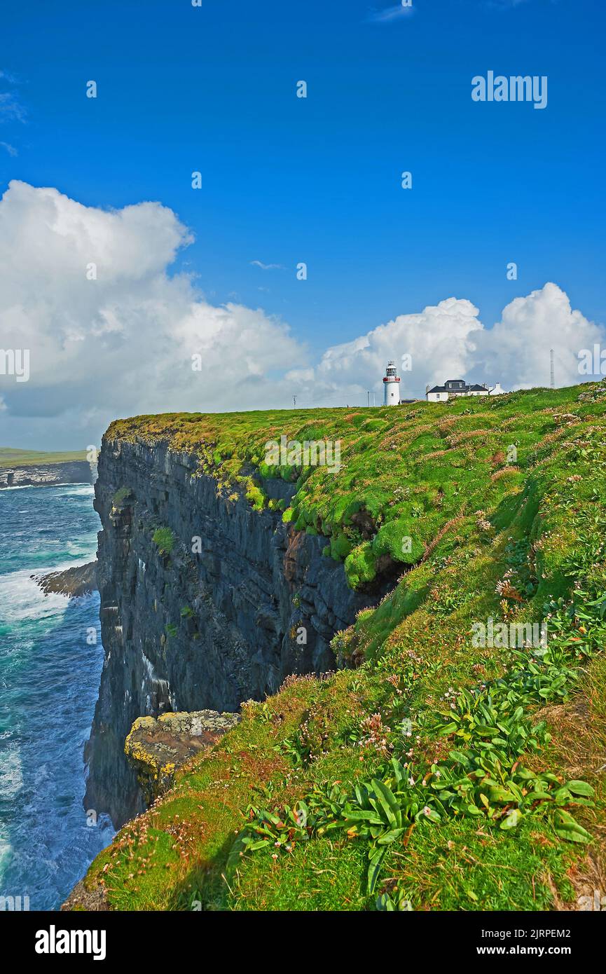 Loop Head Lighthouse on the Loop Head peninsula, County Clare, Ireland forms part of the Wild Atlantic Way Stock Photo