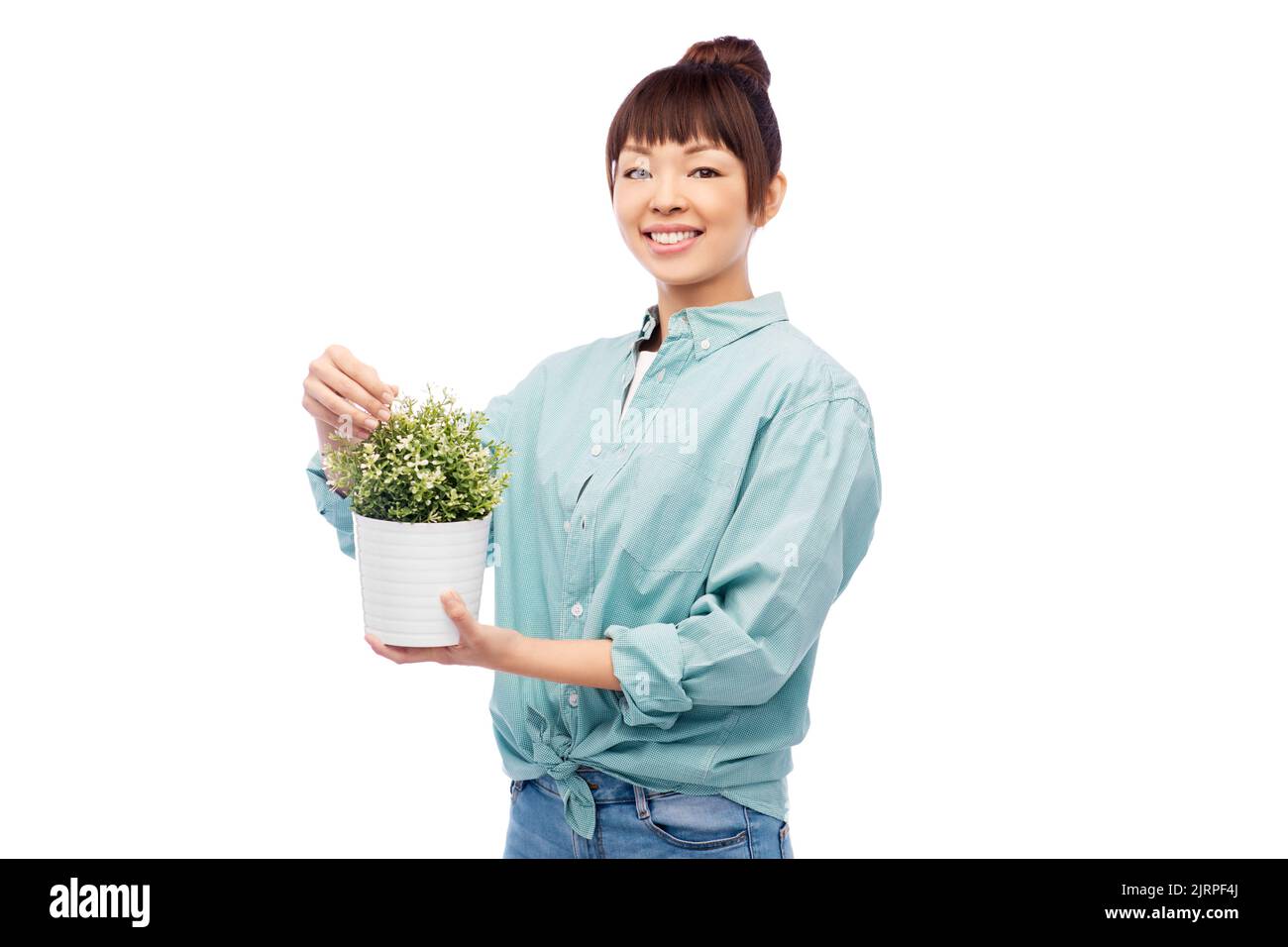 happy smiling asian woman holding flower in pot Stock Photo - Alamy