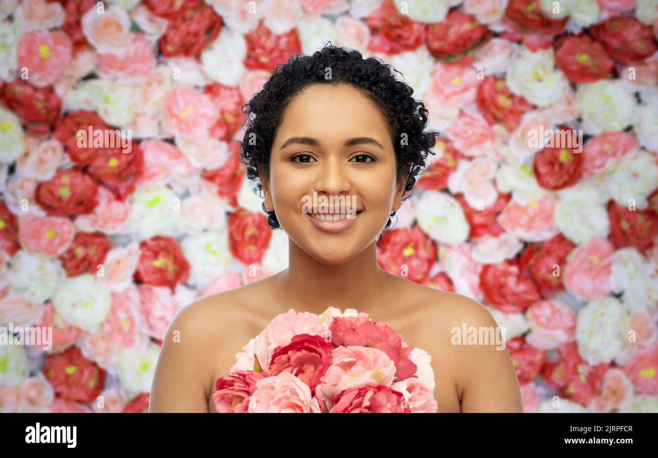 Lovely black woman pink flowers hires stock photography and images Alamy