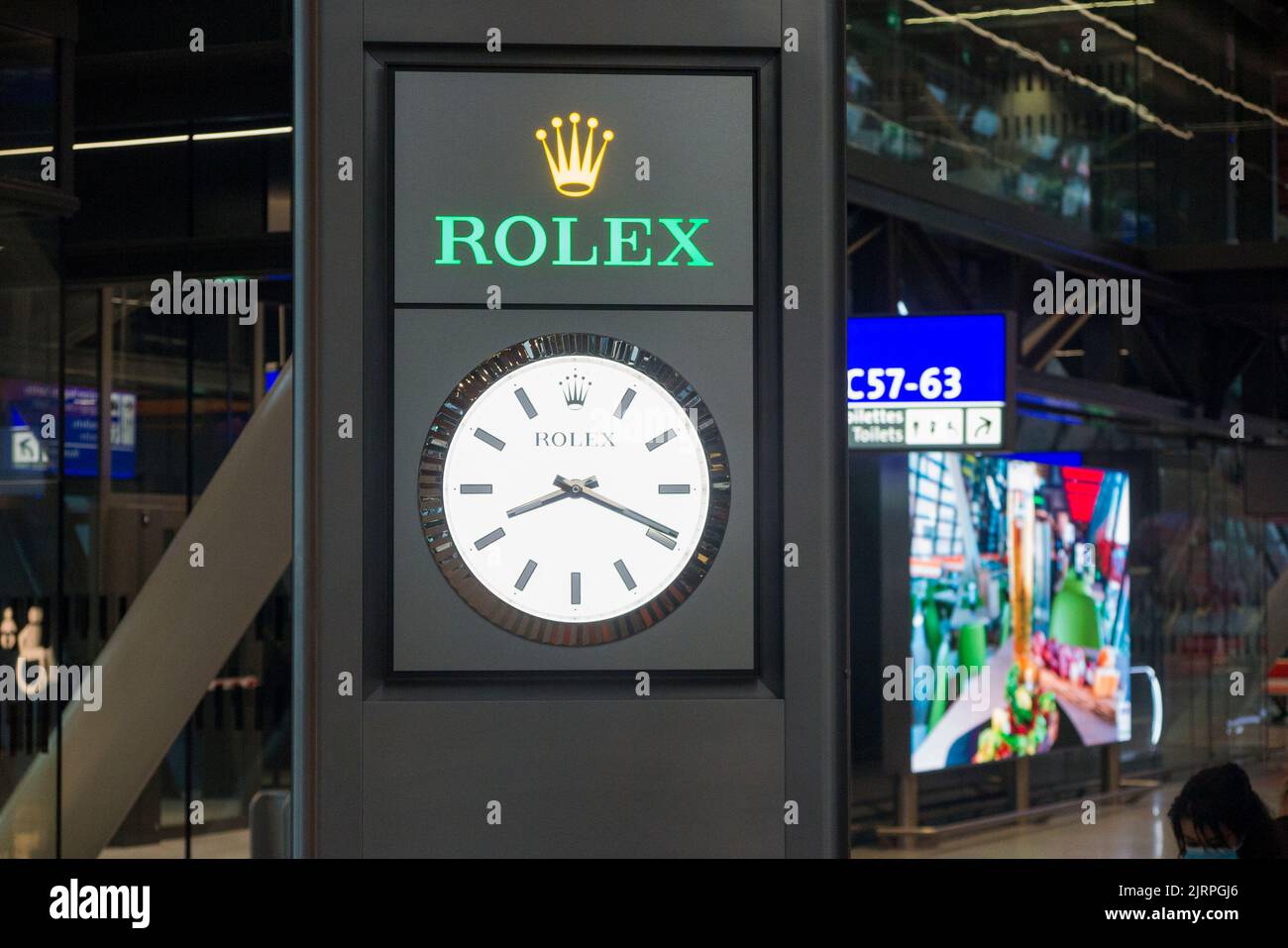 Display clock advertising Rolex brand of watches. The new & modernised