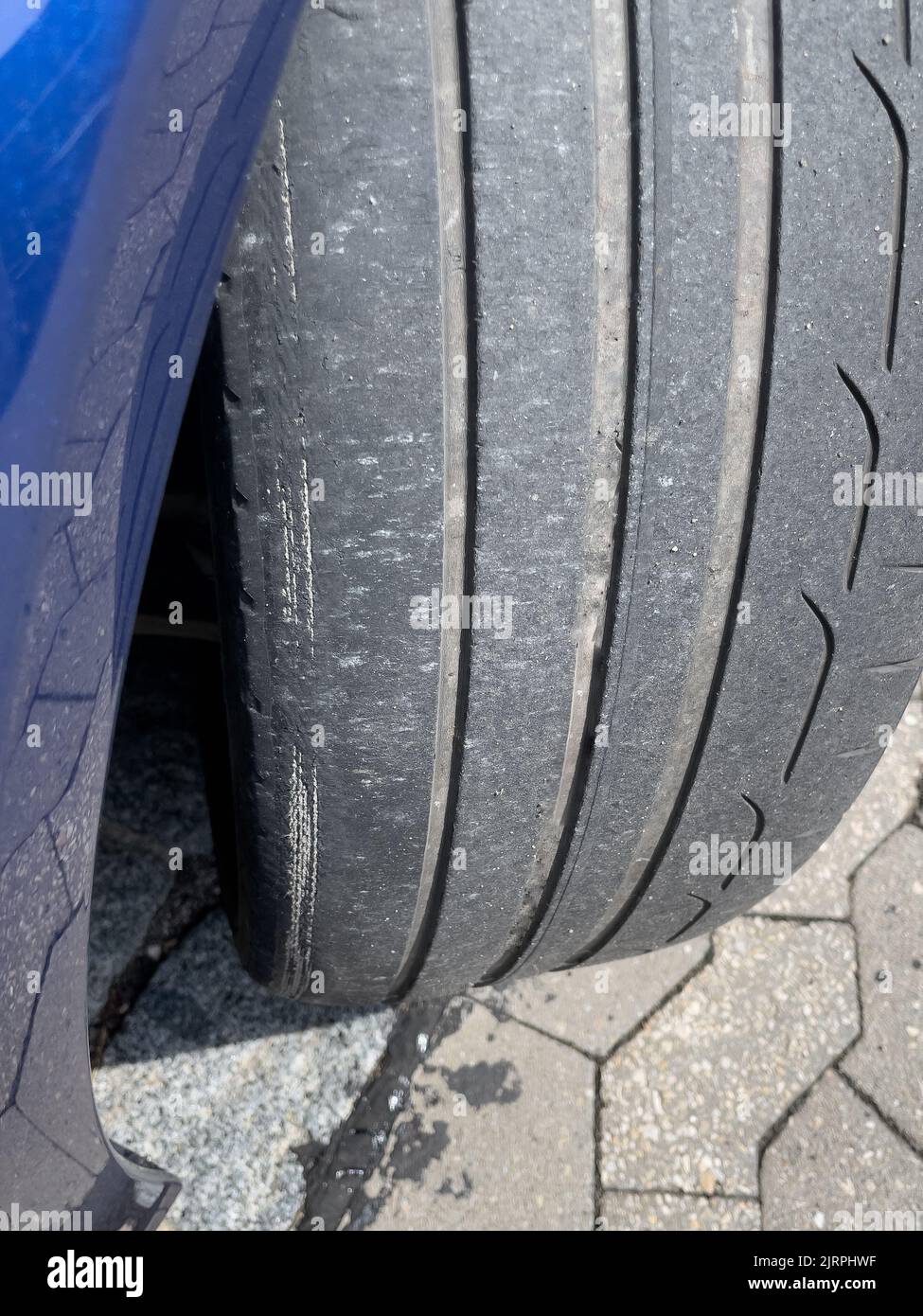 Tires worn on one side on a car with negative camber Stock Photo Alamy