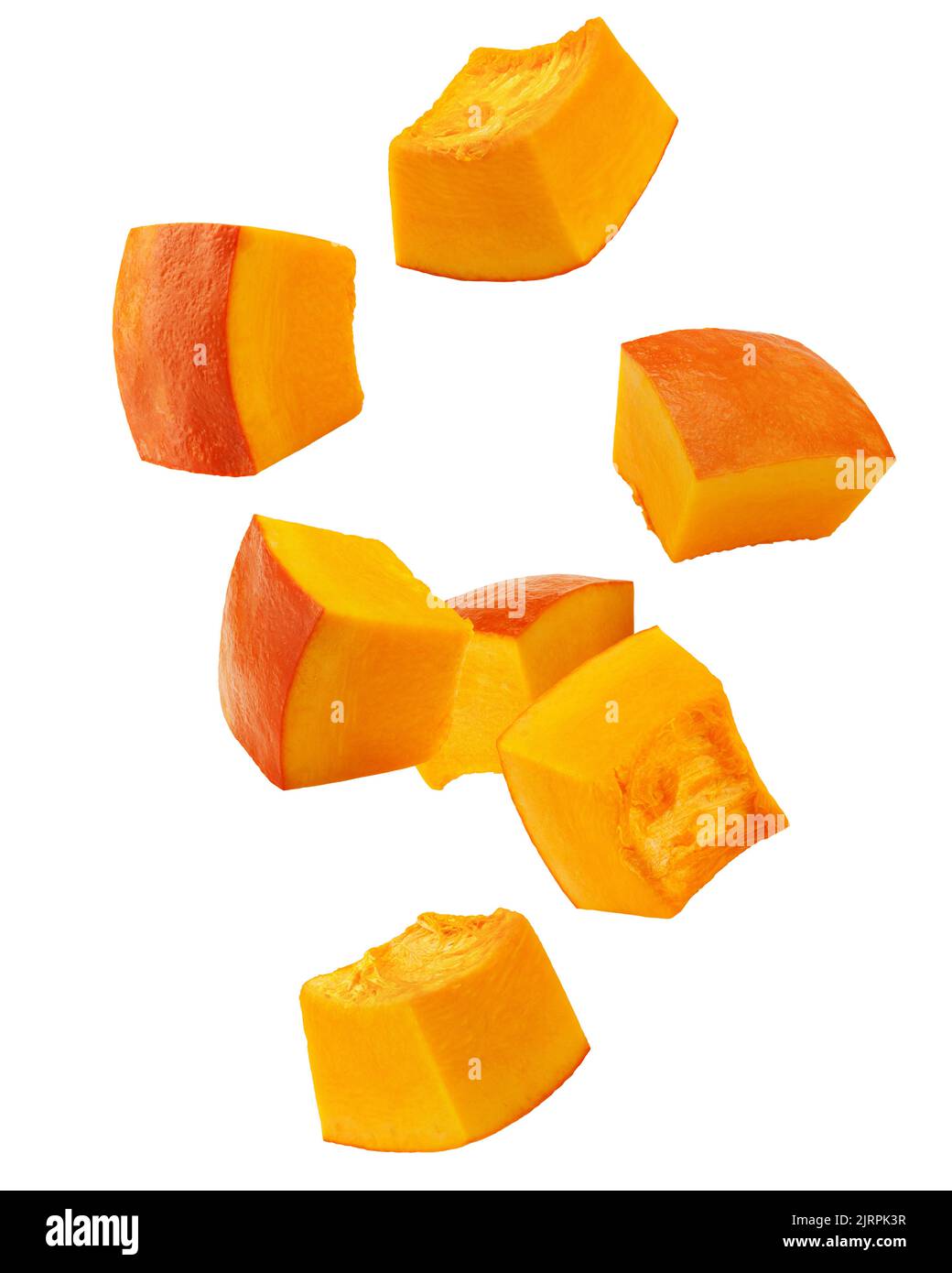 Falling piece of pumpkin, cubes, isolated on white background, clipping path, full depth of field Stock Photo