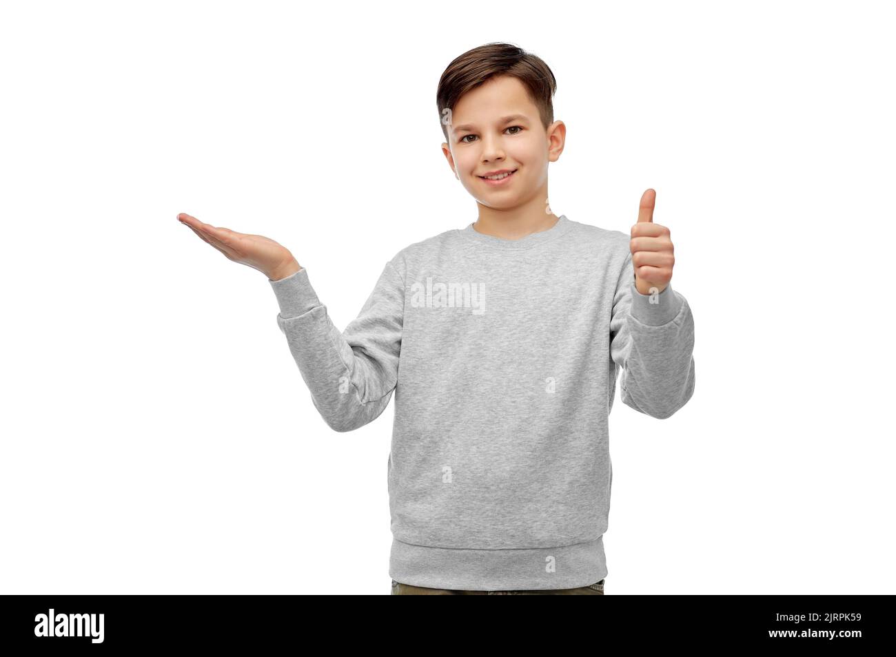 happy boy holding something imaginary on hand Stock Photo - Alamy