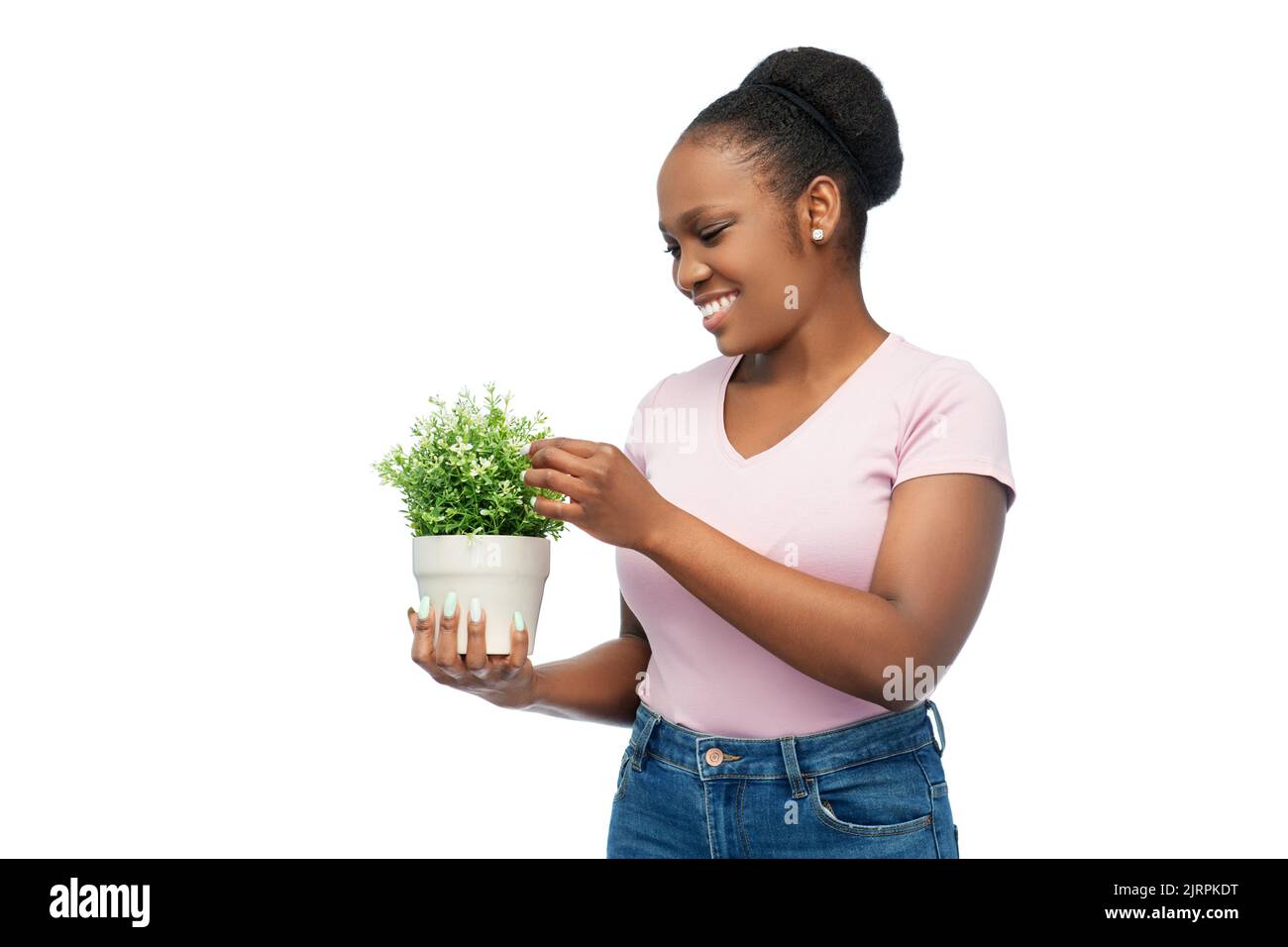 happy smiling african woman holding flower in pot Stock Photo - Alamy