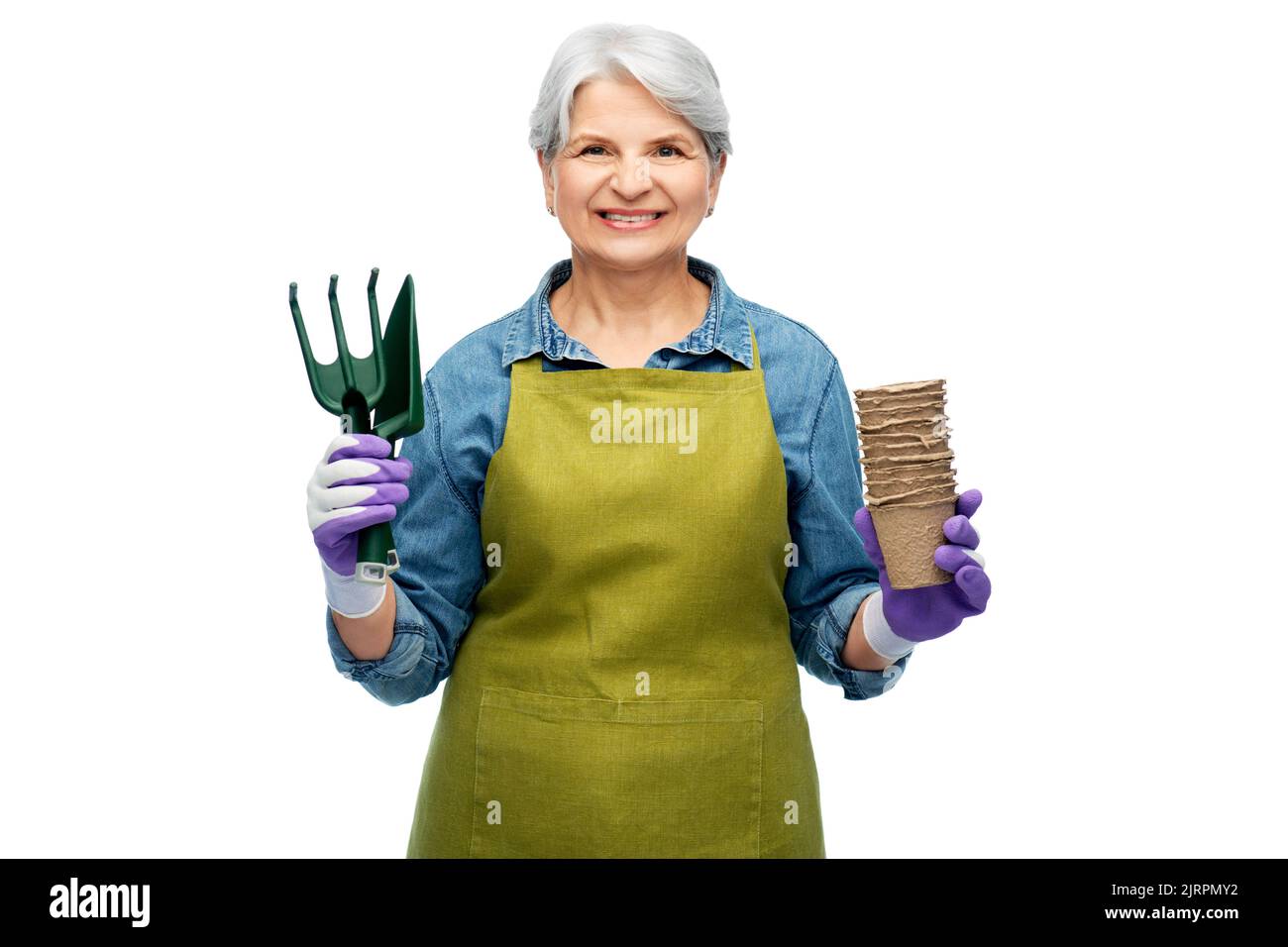 old woman in apron with pots and garden tools Stock Photo - Alamy