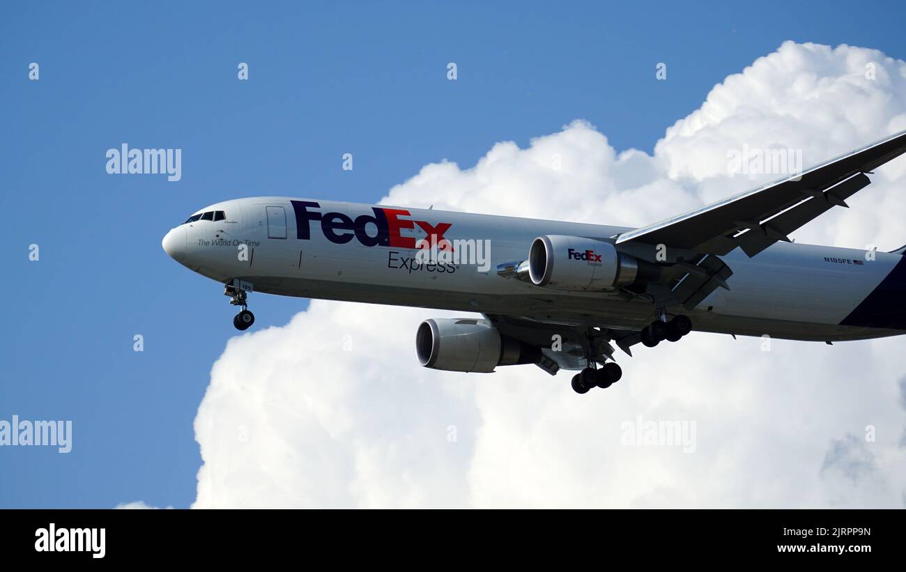 FedEx Boeing 767 cargo plane prepares for landing at Chicago O'Hare International Airport Stock Photo