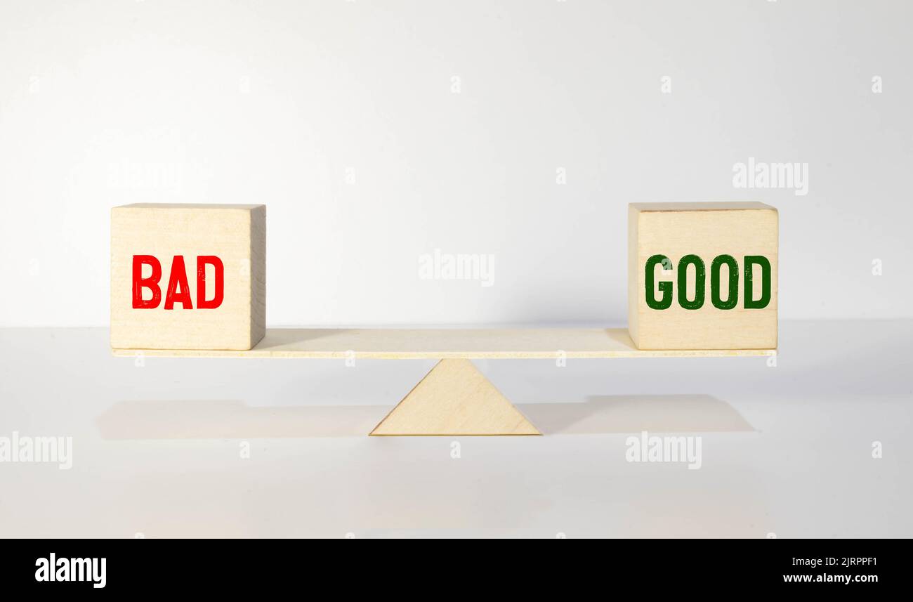 Good and Bad - two little chalkboards with text on wooden background ...