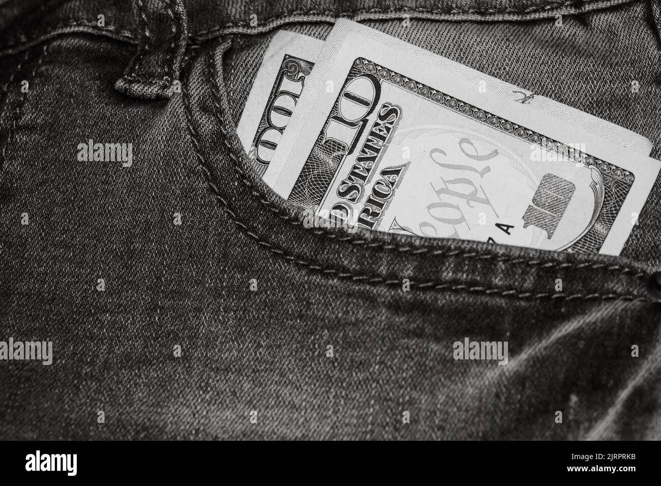 The United States Dollars sticking out of the jeans pocket Stock Photo ...