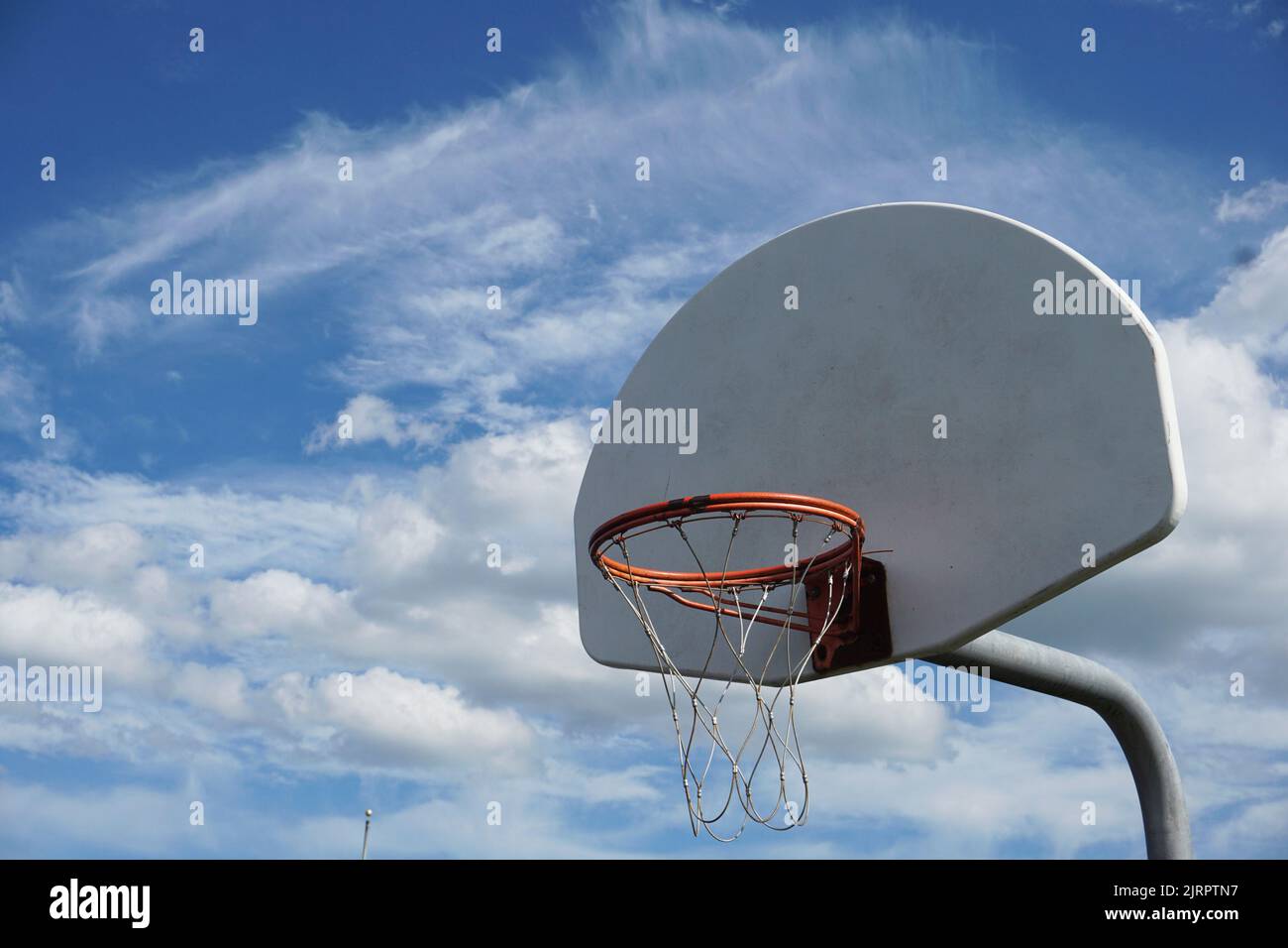 Basketball hoop at a grade school playground Stock Photo Alamy