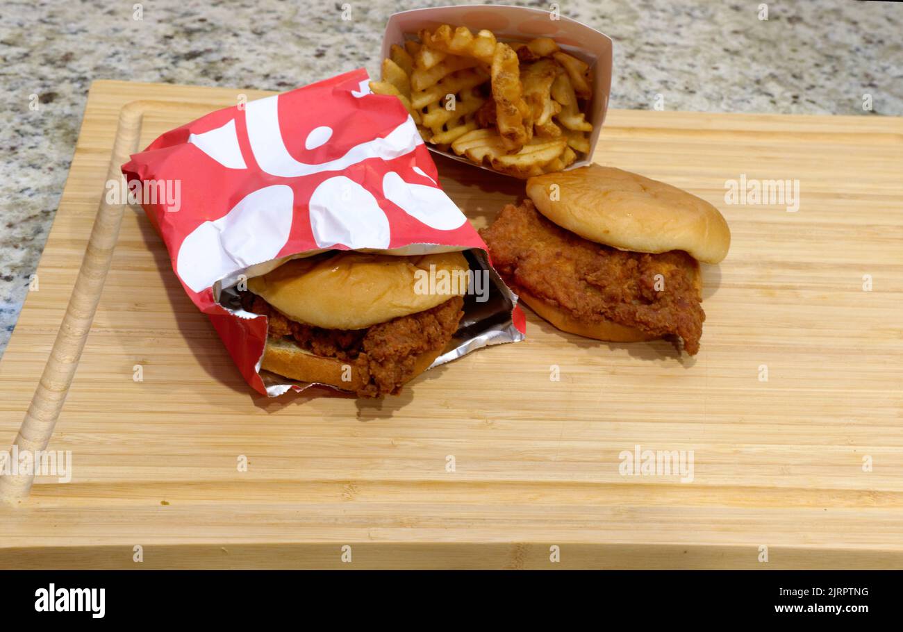 CUMMING, GEORGIA - July 8, 2022: Chick-fil-A, headquartered in College Park, Georgia, is one of the largest American fast-food restaurant chains and t Stock Photo
