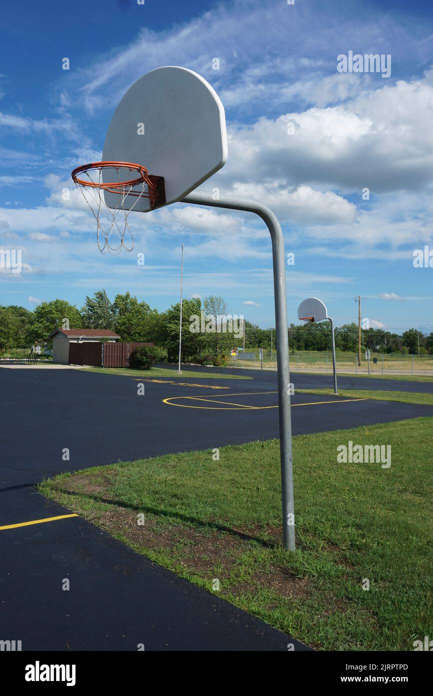 Basketball hoop at a grade school playground Stock Photo Alamy