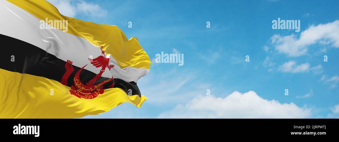 flag of Austronesian peoples Bruneians at cloudy sky background, panoramic view.flag representing ethnic group or culture, regional authorities. copy Stock Photo