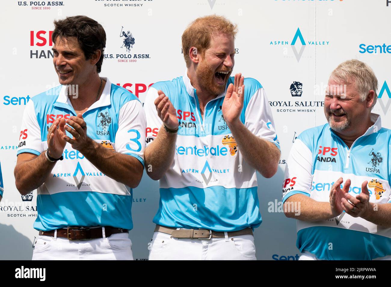 The Duke of Sussex and Nacho Figueras (left) during a prize giving ceremony after taking part in a polo match during the Sentebale ISPS Handa Polo Cup at the Aspen Valley Polo Club in Carbondale, Colorado in the United States. Picture date: Thursday August 25, 2022. Stock Photo