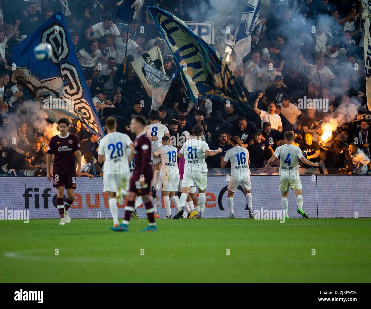 Edinburgh, UK. 25th Aug, 2022. Europa League Play-Off - Heart of Midlothian FC v Fc Zurich 25/08/2022. Hearts play host to FC Zurich in the Europa League Play-Offs at Tynecastle Park, Edinburgh, Midlothian, UK. Pic shows: Zurich celebrate after midfielder, Fabian Rohner, put the visitors 3-1 ahead on aggregate in the 80th minute. Credit: Ian Jacobs/Alamy Live News Stock Photo