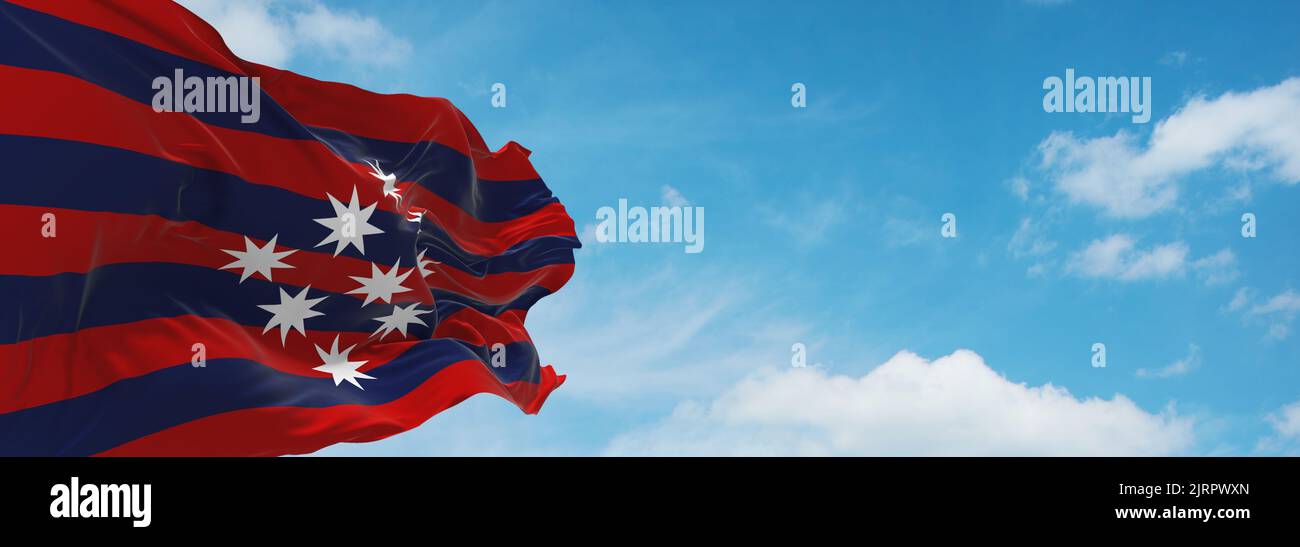 flag of Austronesian peoples Minahasans at cloudy sky background, panoramic view.flag representing ethnic group or culture, regional authorities. copy Stock Photo