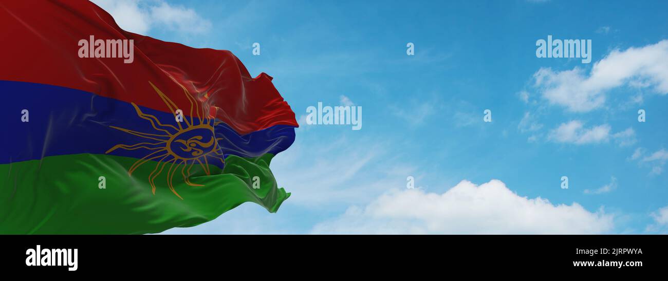 flag of Austronesian peoples Kapampangans at cloudy sky background, panoramic view.flag representing ethnic group or culture, regional authorities. co Stock Photo