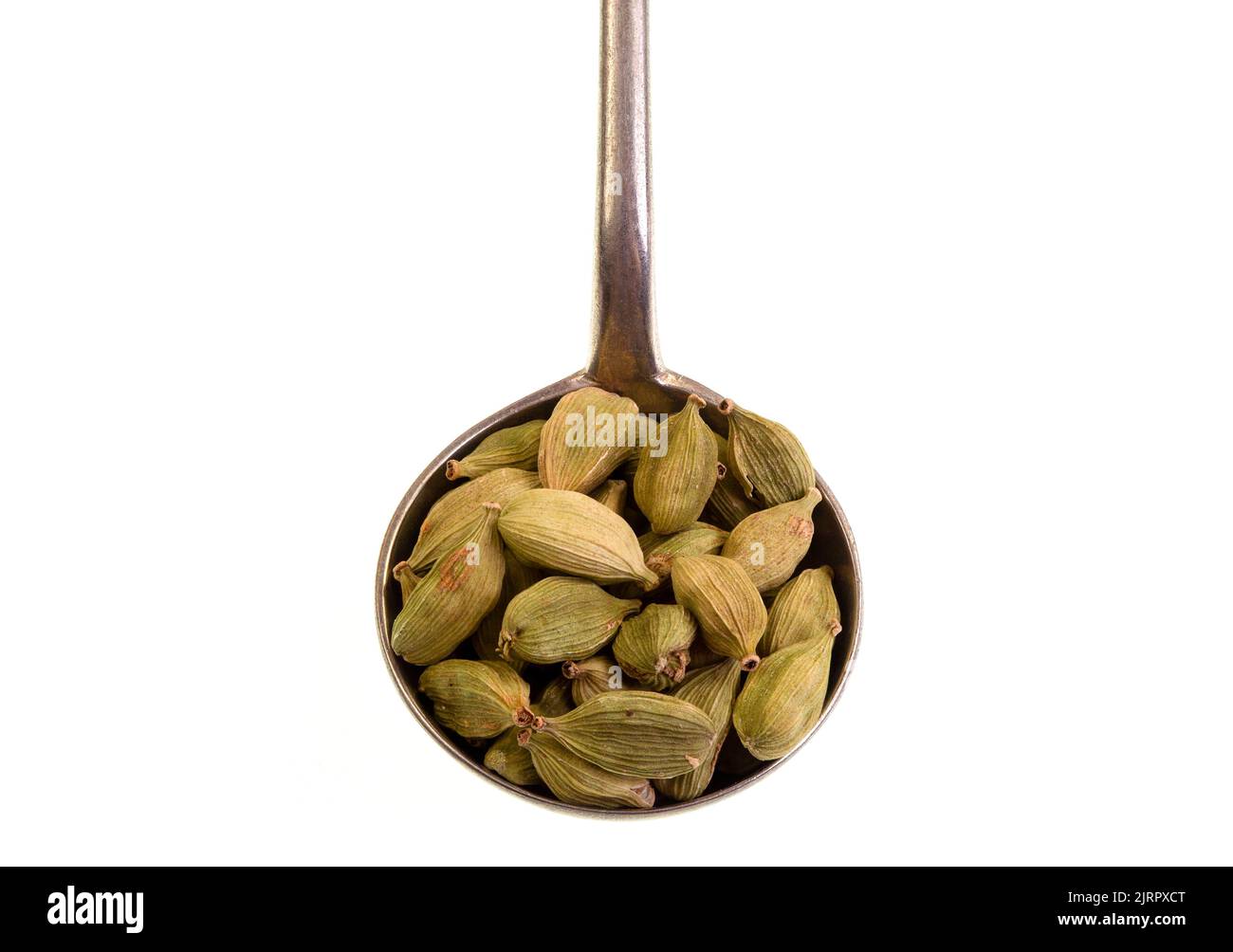 Cardamom is a spice made from the seeds of plants in the genera Elettaria, family Zingiberaceae, native of the Indian subcontinent and Indonesia. Stock Photo
