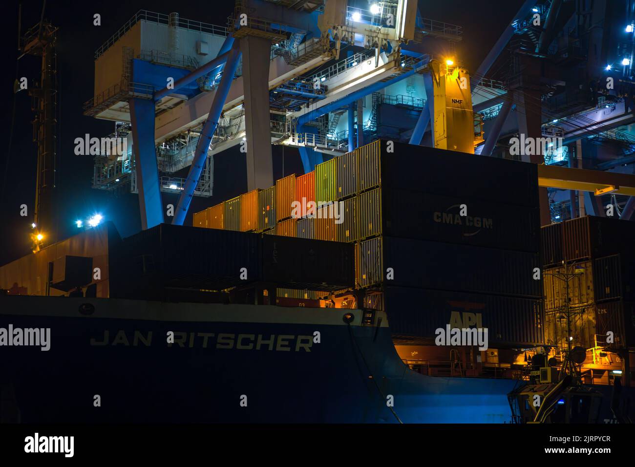 Containers loading by crane in the night , Trade Port. container ...