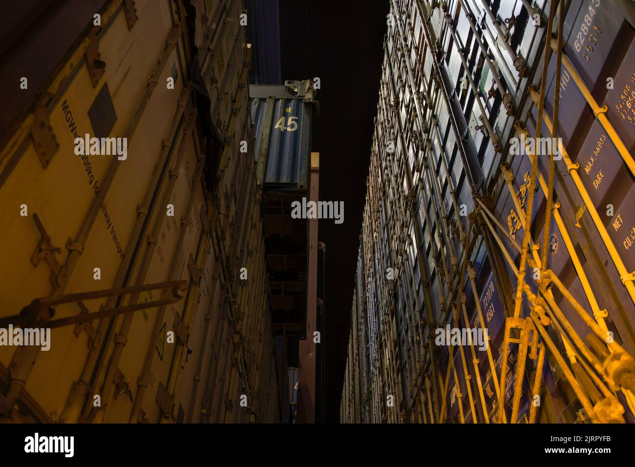Containers loading by crane in the night , Trade Port. container ...