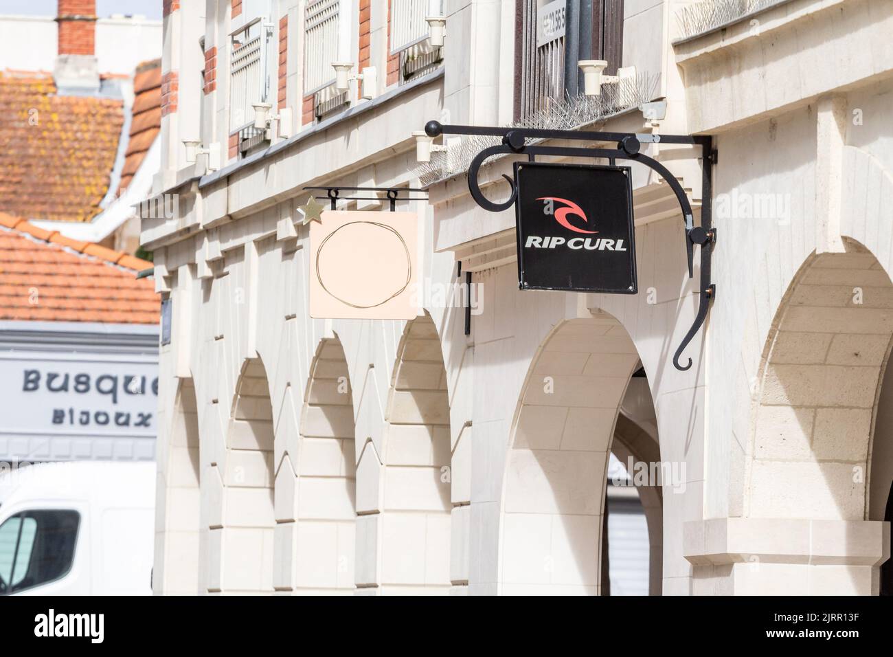 Picture of a sign with the logo of Rip Curl on their store in Bordeaux, France. Rip Curl is a designer, manufacturer, and retailer of surfing sportswe Stock Photo