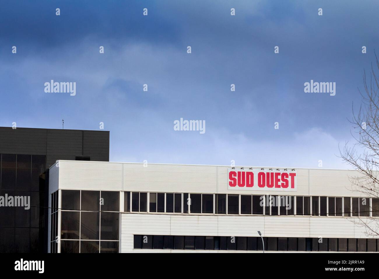 Picture of a sign with the logo of Sud Ouest taken in front their headquarters in Bordeaux, France. Sud Ouest is a daily French newspaper, the third l Stock Photo