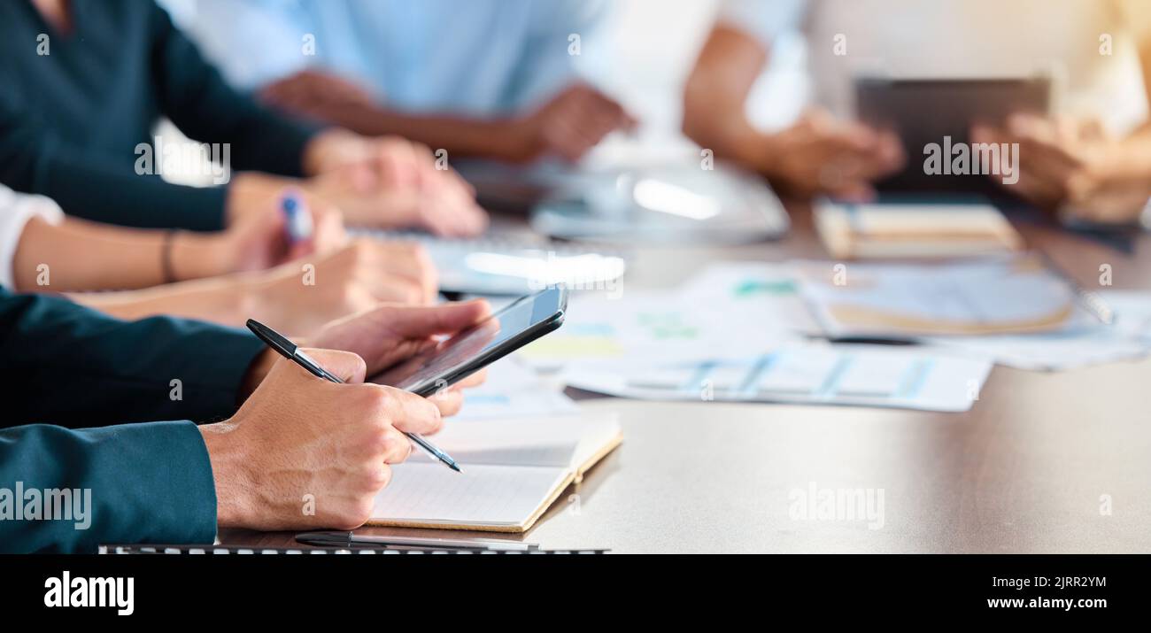 Business marketing meeting and manager with tablet searching the internet for teamwork in an office. Closeup hands of employee working on project Stock Photo