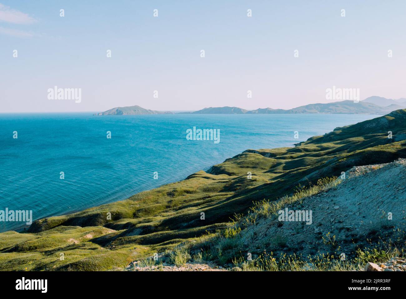 View of steep green rocky slope