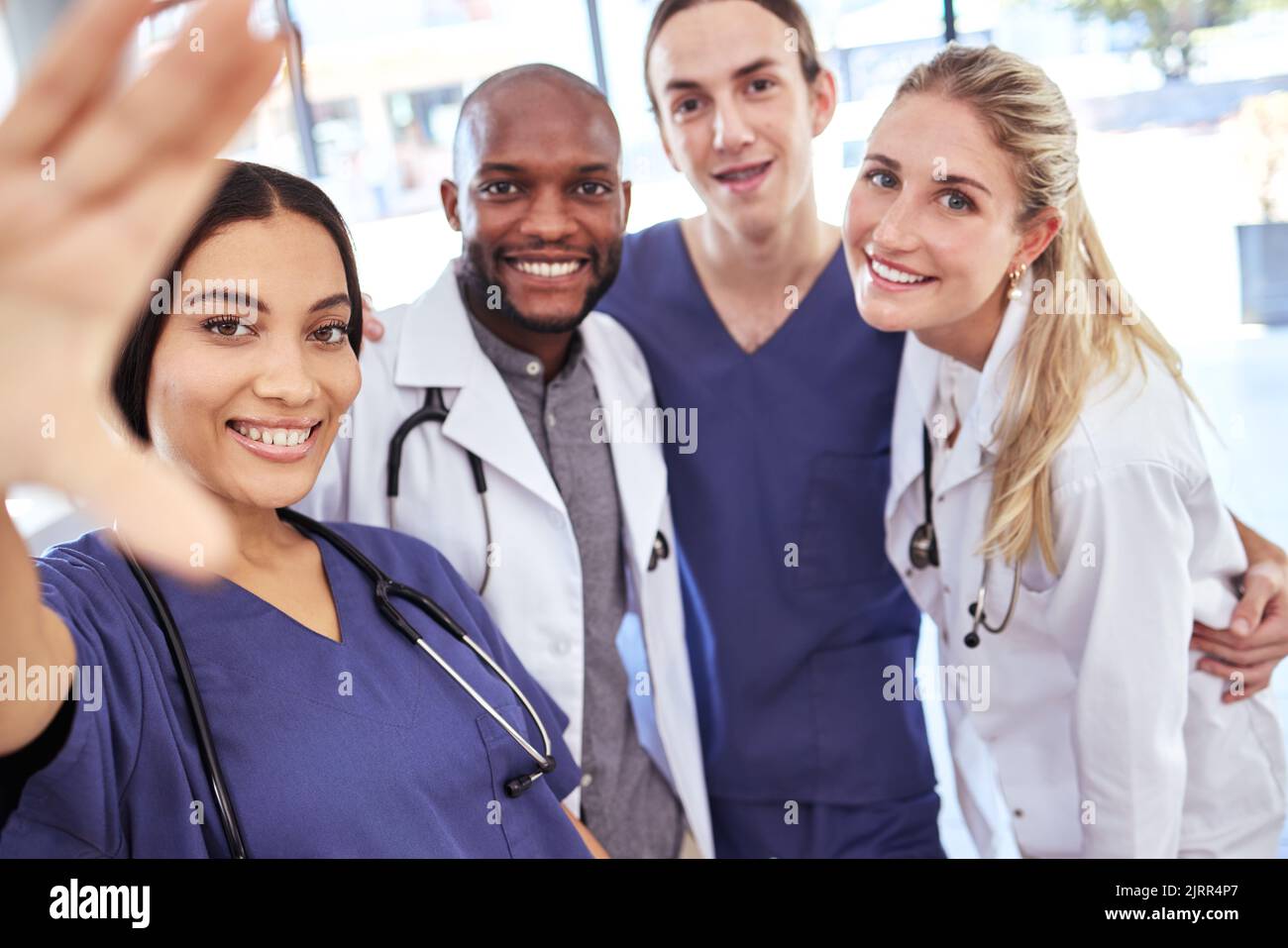 Team of doctors take a selfie together after success in the surgery