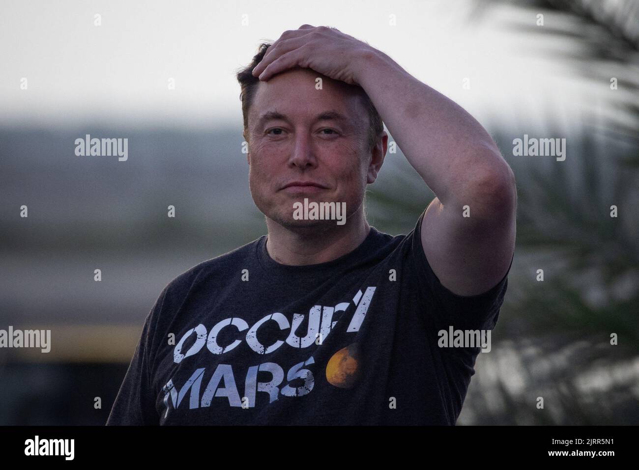 SpaceX Chief Engineer Elon Musk takes part in a joint news conference with T-Mobile CEO Mike Sievert (not pictured) at the SpaceX Starbase, in Brownsville, Texas, U.S., August 25, 2022. REUTERS/Adrees Latif Stock Photo