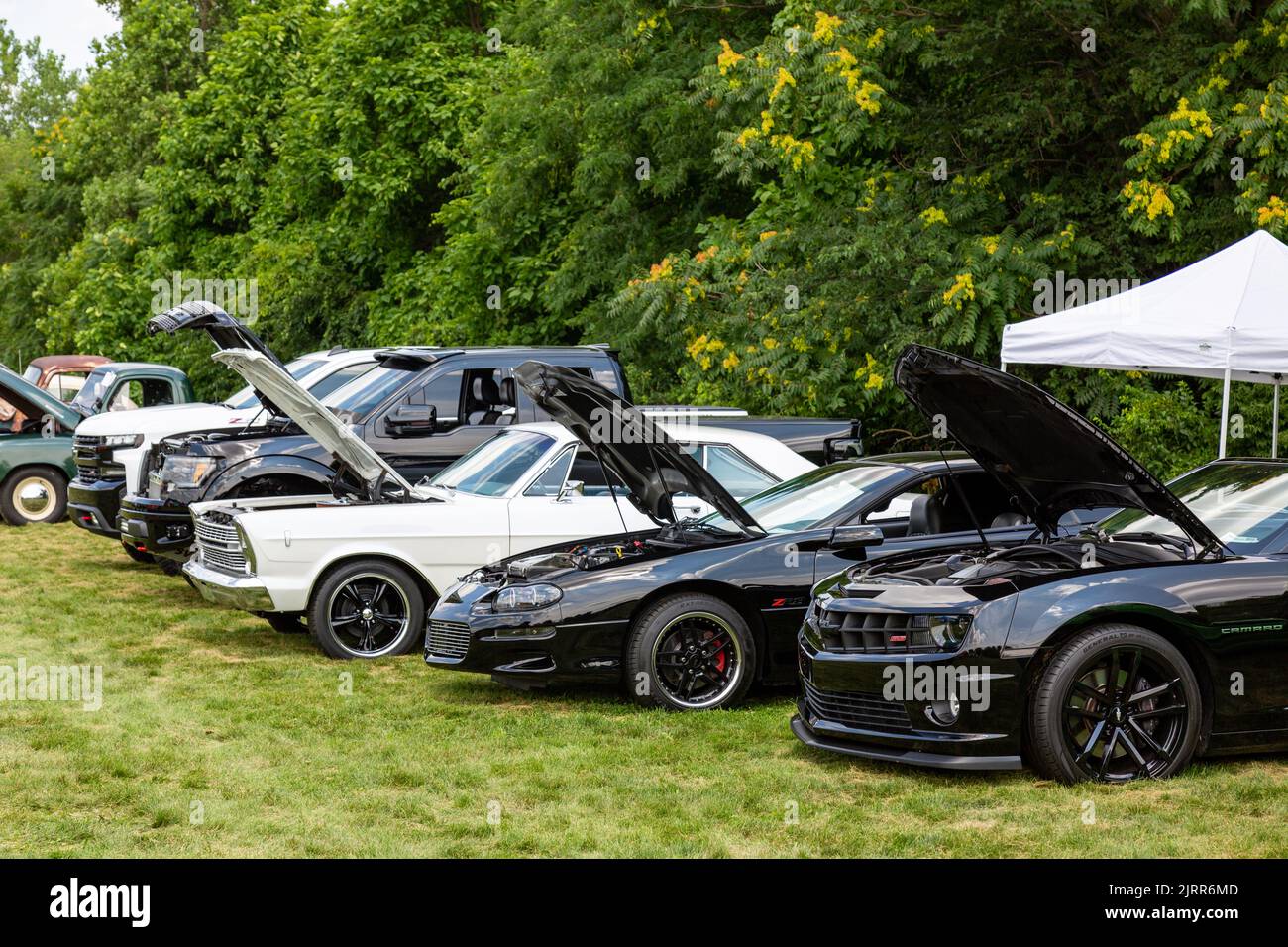 A row of American classic cars on display at a car show in Fort Wayne