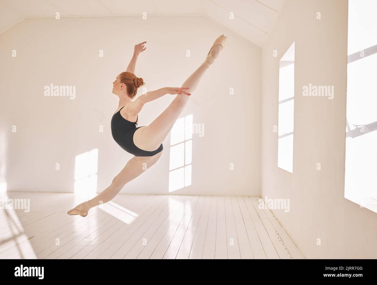 Ballet, jump and performance dance studio with young student. Dancer