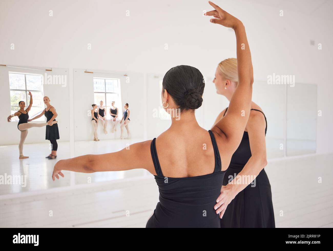 Ballet dancer, mirror and teacher in exercise studio with student for dance training workout